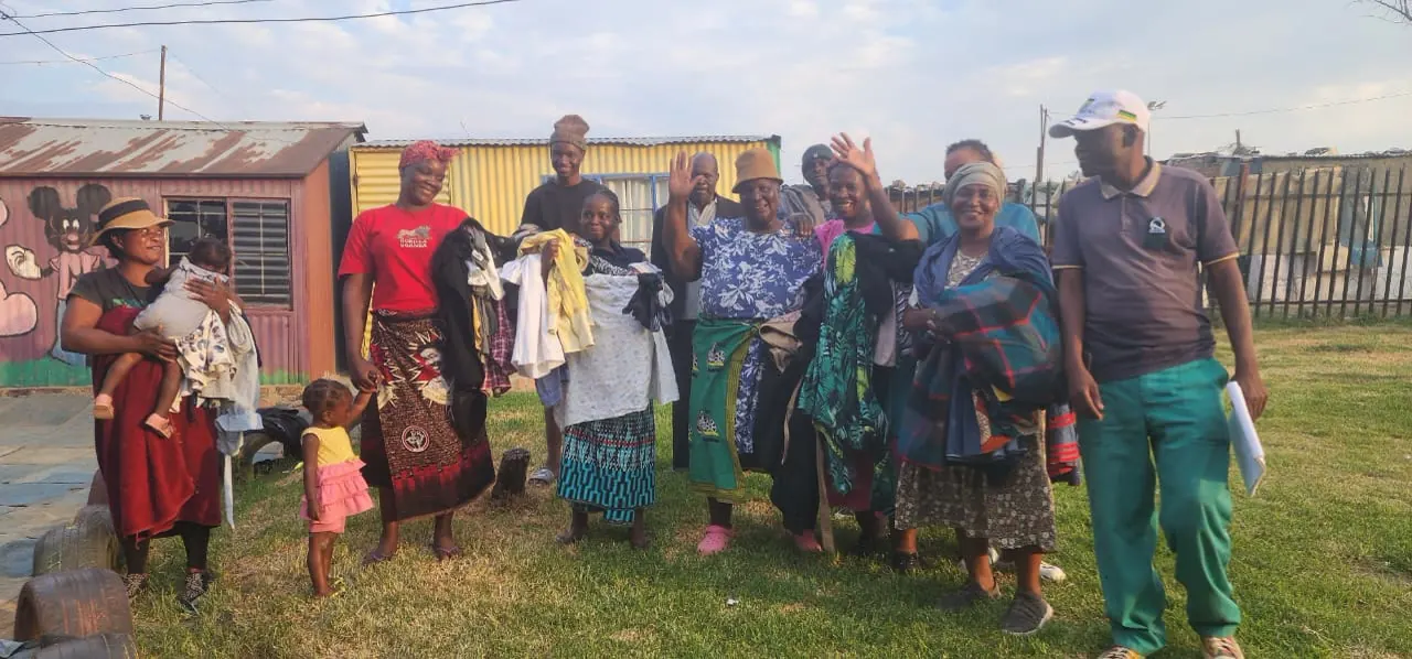 Warm clothing handed to families