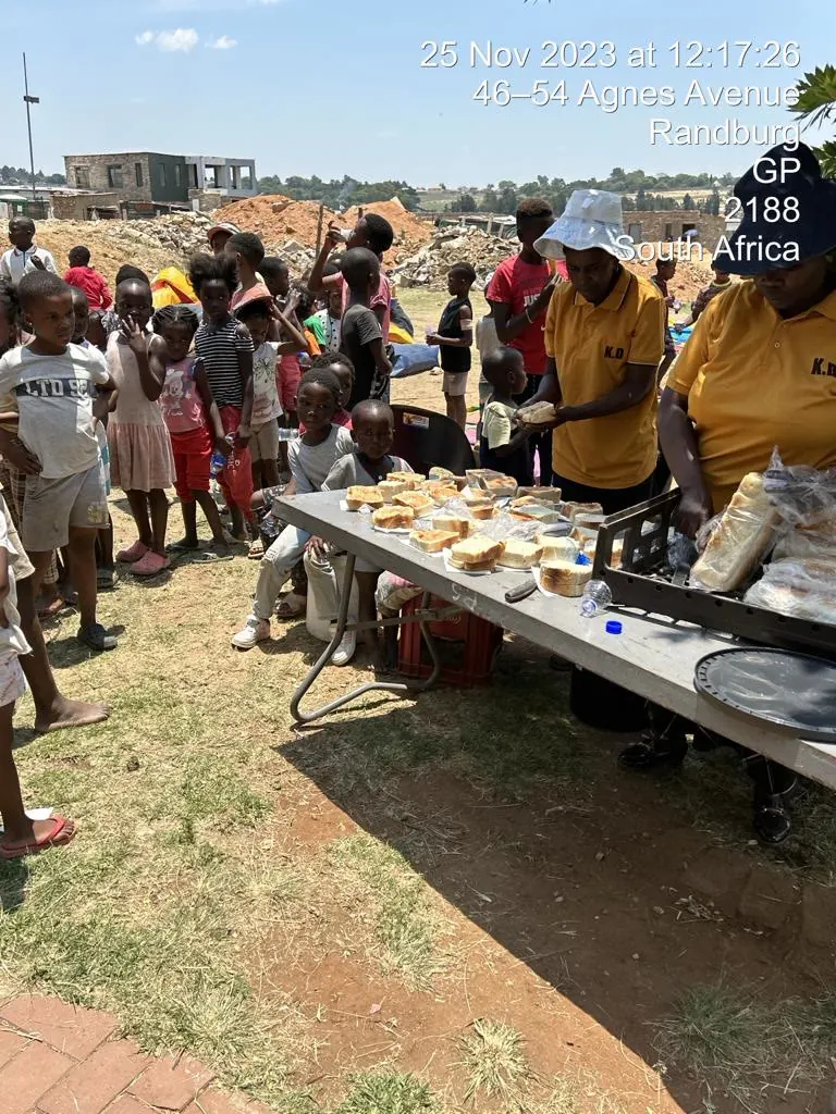 Volunteers serving hot meals