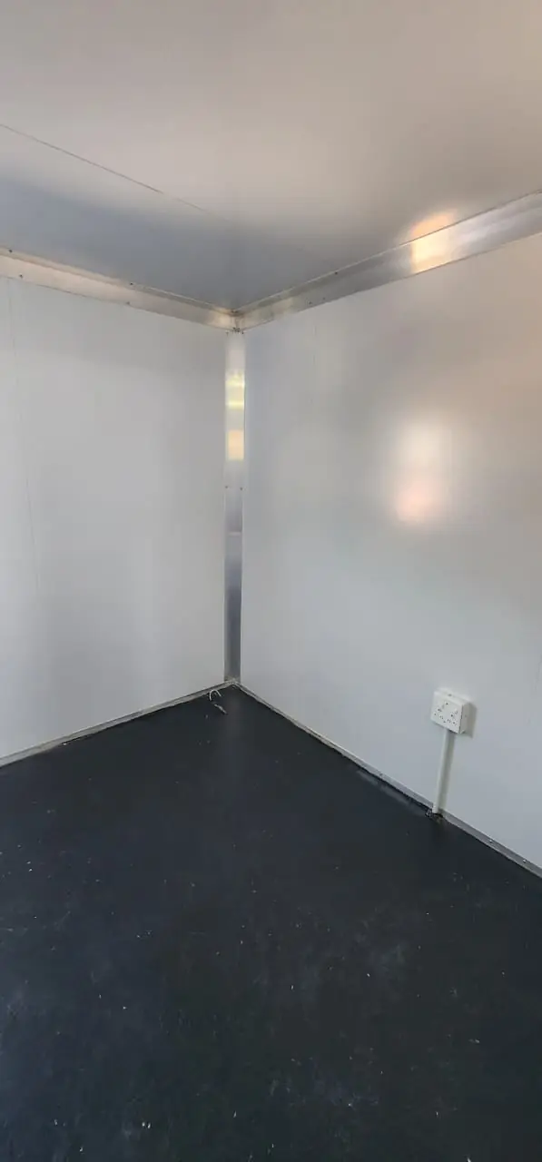 Electrical wall socket installed in the corner of a UDRS unit