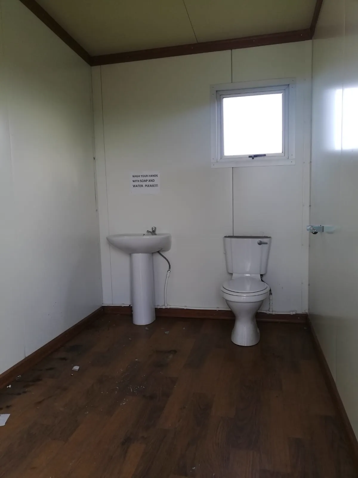 A finished bathroom inside a converted container