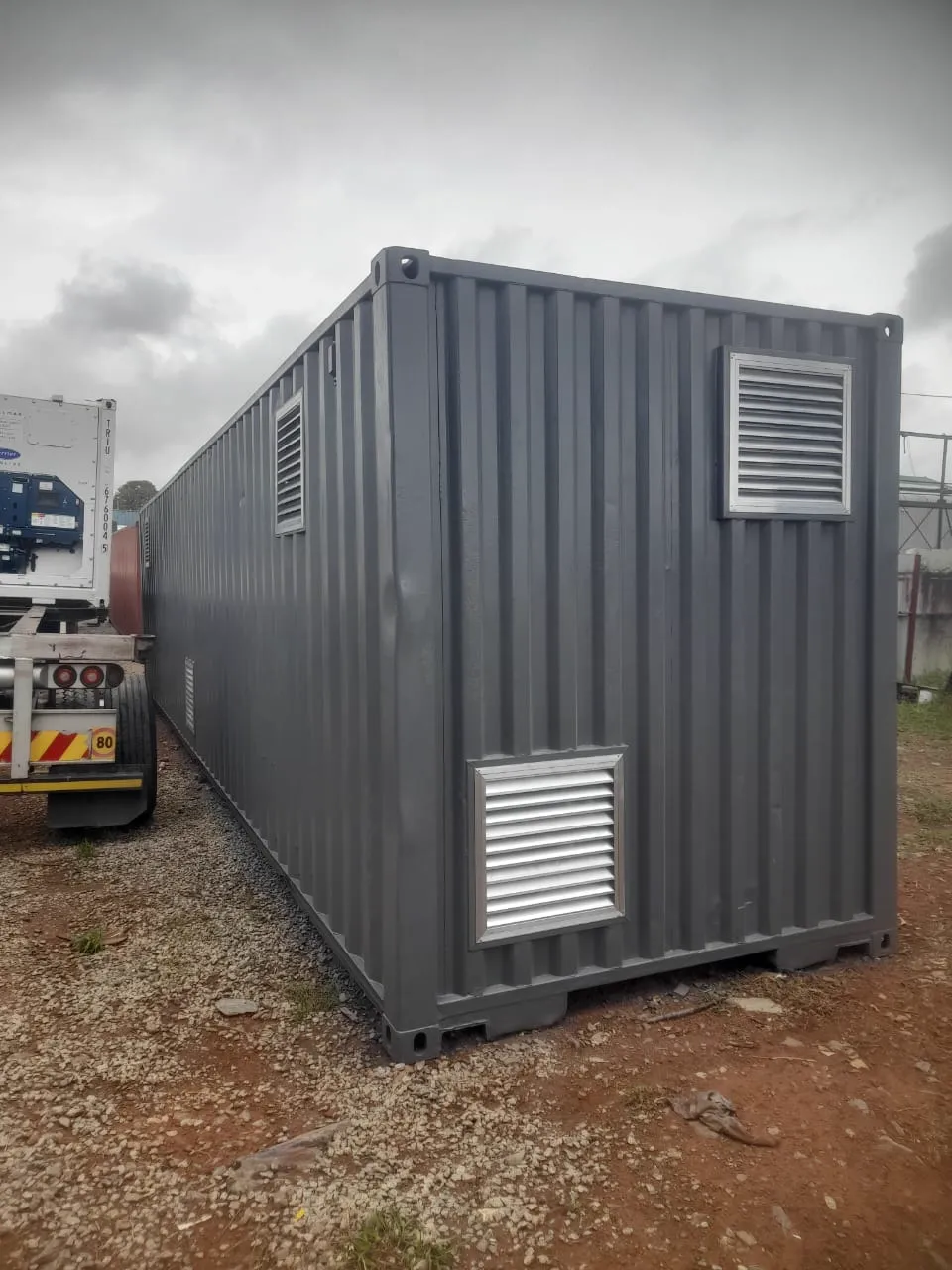 A container unit on the truck bed, ready for delivery